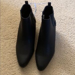 Woman’s black ankle boots